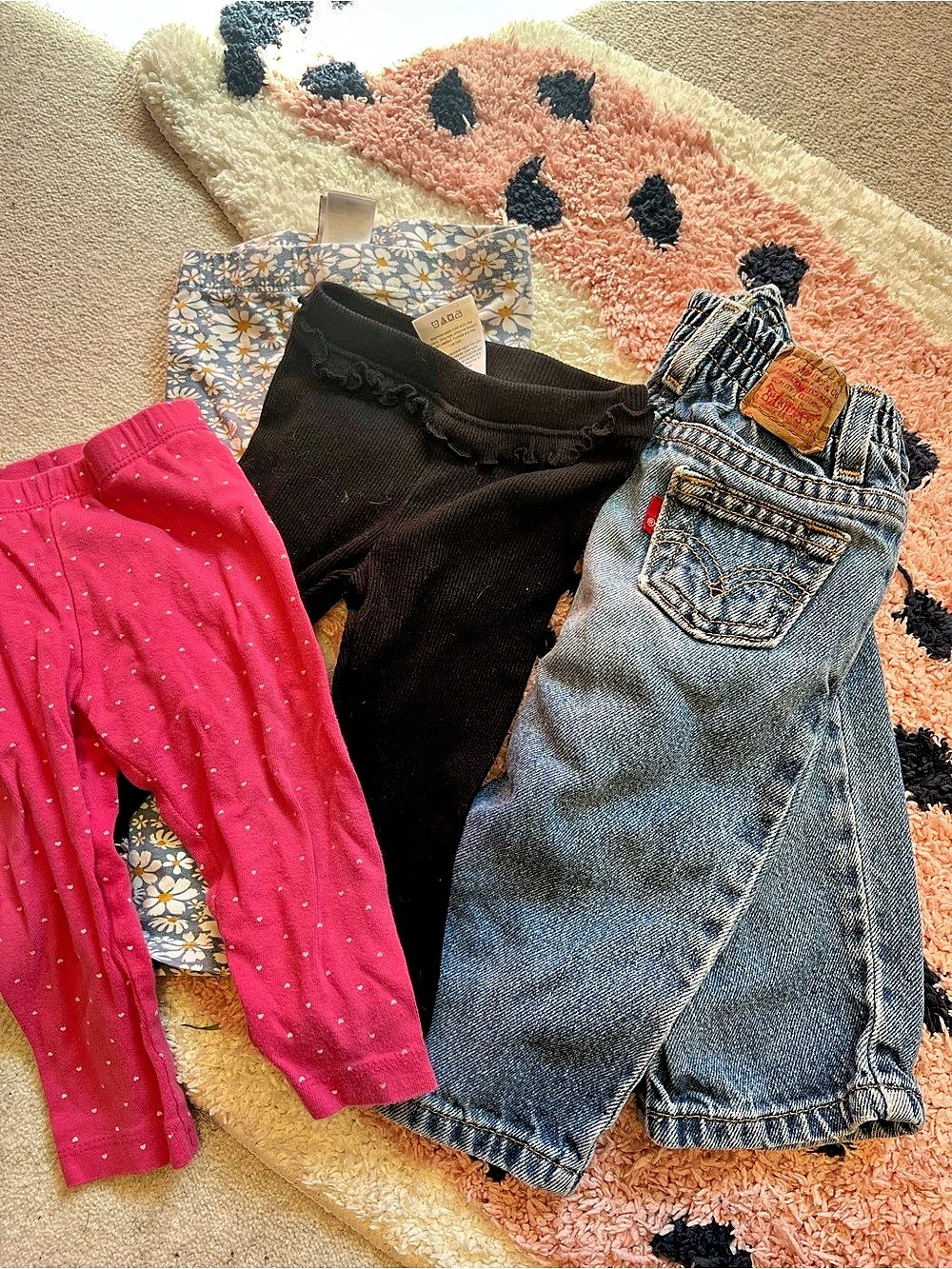 Lot of 11 pairs of baby pants